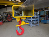 forklift mounted lifting hook attachment single pocket rear view clamped to fork.