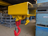 forklift mounted lifting hook attachment single pocket angled view.