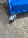 Blue metal lifting equipment on castor.