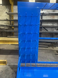 Blue equipement metal shelving hook unit.